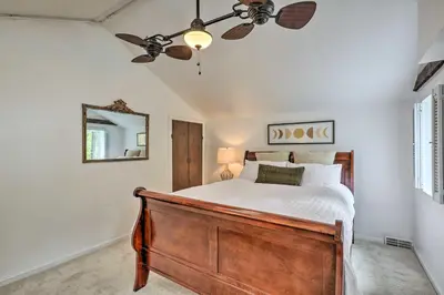 a bedroom with a bed and a ceiling fan at Historic Home in Lambertville Walk to Bridge in Lambertville