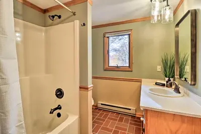 a bathroom with a sink and a shower at Outdoor Theater, Deck and Fire Pit Poconos Retreat in Lake Harmony