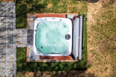 an aerial view of a bath tub in the grass at Welcome to The Mountain Escape! in Albrightsville
