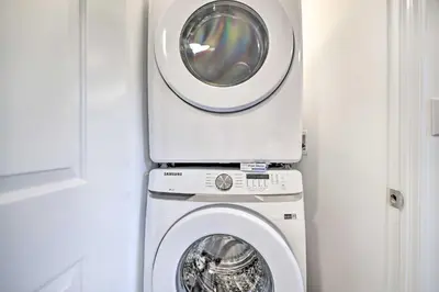a washing machine and a washer in a bathroom at Game Room! Tobyhanna Retreat 17 Mi to Ski Slopes in Tobyhanna