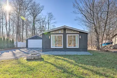 a small house in the middle of a yard at Game Room! Tobyhanna Retreat 17 Mi to Ski Slopes in Tobyhanna