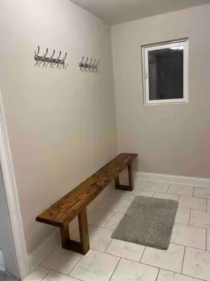 a room with a wooden bench on a wall at Modern Home near Lake w HotTub, Game Room, Fireplace in Albrightsville