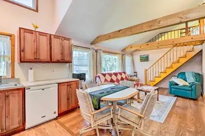 a kitchen and dining room with a table and chairs at Cozy Tannersville Gem - Ski, Hike, Explore! in Tannersville
