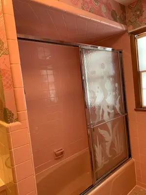 a shower with a glass door in a bathroom at #3 QueenSize Bed bright room near New Brunswick NJ downtown in New Brunswick