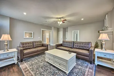 a living room with couches and a coffee table at Suites on Seneca - Lovely 2 Bed 1 Bath Apartment in Harrisburg