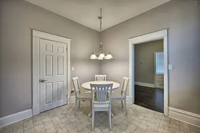 a dining room with a table and chairs at Suites on Seneca - Lovely 2 Bed 1 Bath Apartment in Harrisburg