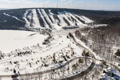 an aerial view of a snow covered ski slope at Midlake Memories in Lake Harmony