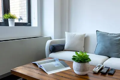 a living room with a couch and a coffee table at 809-6B 2BR Duplex Breathtaking Views Beauty in New York