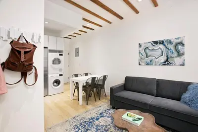 a living room with a couch and a table at 24-6 Gramercy area Newly reno Studio W D in unit in New York