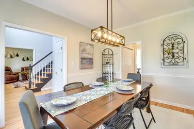 a dining room with a table and chairs at Calm Columbia Haven Outdoor Pool, Hot Tub! in Delaware Water Gap