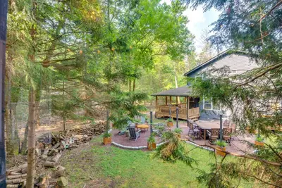 an overhead view of a cabin in the woods with trees at Hot Tub, Beach Access Albrightsville Retreat! in Albrightsville