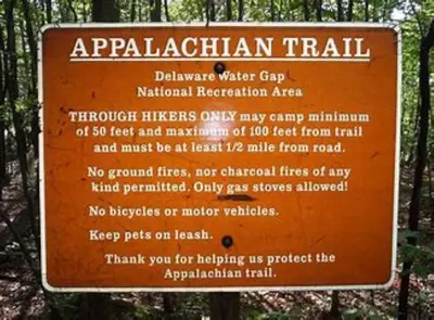 a sign for arapahannel trail in a forest at Private Lakeview Cottage and 2 Farmhouse Apartments near Rt 80 easy to NYC in Blairstown