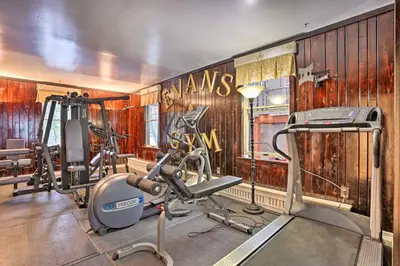 a fitness room with a gym with tread machines at 1 Mi to Lake Wallenpaupack Spacious Poconos Villa in Hawley