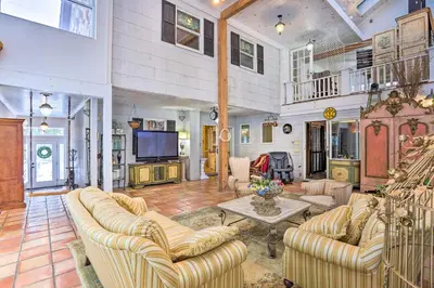 a large living room with couches and a tv at 1 Mi to Lake Wallenpaupack Spacious Poconos Villa in Hawley