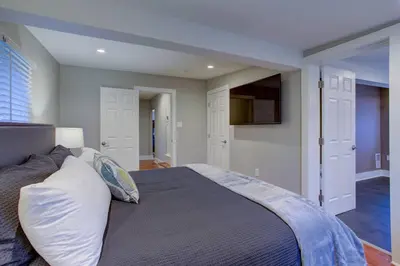 a bedroom with a large bed in a room at Calla Lily Farmhouse in Manheim