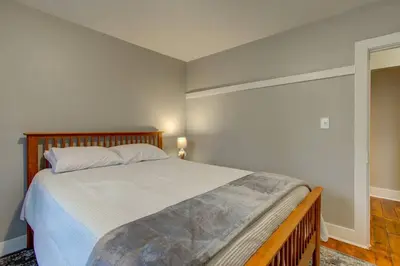 a bedroom with a large bed in a room at Calla Lily Farmhouse in Manheim