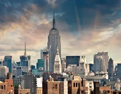 a skyline of a city with a large building at Modern Luxury Apartment near NYC in Jersey City