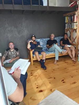 a group of people sitting on a couch at Livingston Manor YURT in Parksville