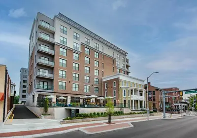 a large brick building on a city street at Hyatt Place Newark-Main Street in Newark