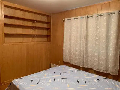 a bedroom with a bed and a curtain at #2 Cozy Queen size bedroom @New Brunswick NJ downtown in New Brunswick