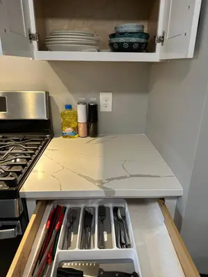 a kitchen with a stove and an open refrigerator at M2 Comfortable Room near Rutgers U, hospitals in New Brunswick
