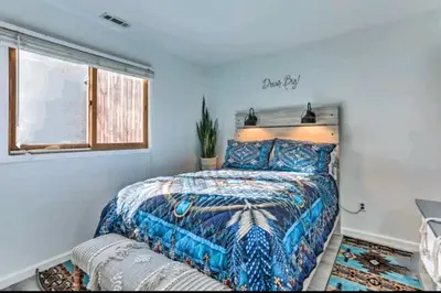 a bedroom with a bed and a window at Great Gorge-ous condo in Vernon Township