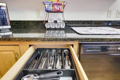 a drawer in a kitchen with utensils in it at Luxury Spacious Home with some FREE Amenities and Activities! in Mushroom Farms