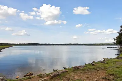 a large body of water with clouds in the sky at Spacious Home by Kalahari Waterpark, Camelback, Jim Thorpe, FREE EV and PRIVATE SAUNA in Albrightsville