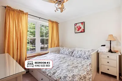 a bedroom with a bed and a window at Spacious Home by Kalahari Waterpark, Camelback, Jim Thorpe, FREE EV and PRIVATE SAUNA in Albrightsville