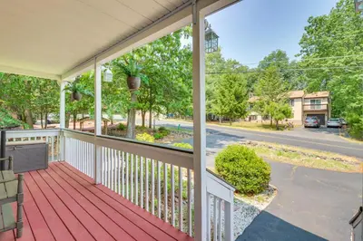 a porch with a view of a street at Gas Grill, Lake Access Scenic Poconos Retreat! in East Stroudsburg