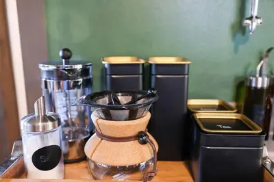 a kitchen counter with a blender on a table at Lake View Enchanted Treehouse- Lake Harmony in Lake Harmony