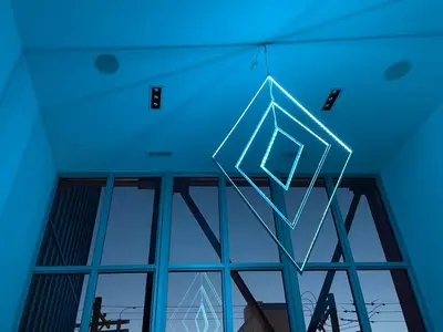 a building with a blue ceiling and a large glass window at Duplex Suite in Art Tower in Philadelphia
