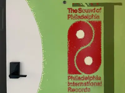 a sign on a wall that says the sound of philippineineineine at Duplex Suite in Art Tower in Philadelphia