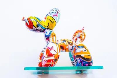 a colorful toy elephant statue on a table at Art Deco Graffiti Suite in Philadelphia