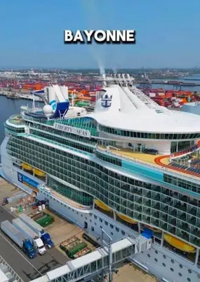 a large cruise ship in a harbor with the words bayonia at Classical Isbills Row House close to NYC in Bayonne