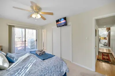 a bedroom with a teddy bear sitting on a bed at Pocono Pines, Lake Naomi 4 bedrooms, 2 full bath in Pocono Pines