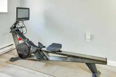 a gym bench with a monitor on top of it at 8 Mi to Tobyhanna State Park Poconos Home! in Mushroom Farms