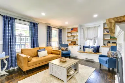 a living room with a couch and two chairs at Bright Cornwall-On-Hudson Vacation Rental! in Cornwall-on-Hudson