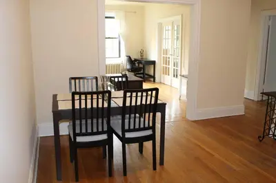 a dining room with a table and four chairs at Fantastic stay for 4 – Heart of Hoboken! in Hoboken