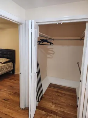 a room with a closet and a bed at Cozy 2-bedroom Apartment in Philadelphia