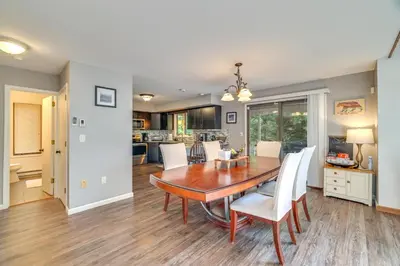 a dining room and kitchen with a table and chairs at Lake Harmony Home Near Big Boulder! in Lake Harmony