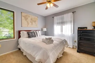 a bedroom with a bed and a ceiling fan at Lake Harmony Home Near Big Boulder! in Lake Harmony