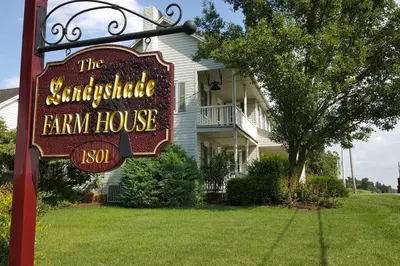 a sign in front of a farm house at Farmhouse at Landyshade in Lancaster