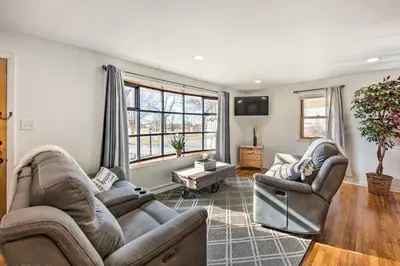 a living room with two couches and a tv at Marietta Home with Private Hot Tub, Pool Table! in Marietta