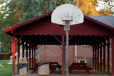 a basketball hoop in front of a building at Marietta Home with Private Hot Tub, Pool Table! in Marietta