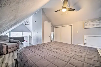 a bedroom with a bed and a ceiling fan at Tobyhanna Home Near Kalahari with Lake and Pool Access in Tobyhanna