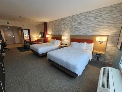 a hotel room with two beds at Home2 Suites By Hilton Allentown Bethlehem Airport in Bethlehem