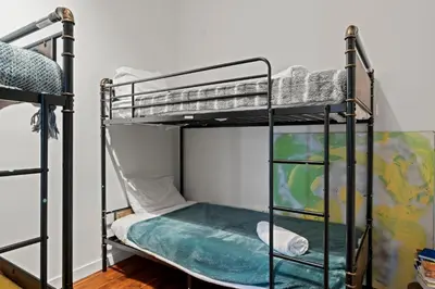a bunk bed room with two bunk beds at The Founders Suite Residence in Philadelphia