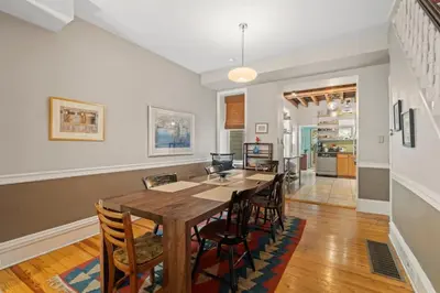 a kitchen and dining room with a table and chairs at Fairmount Neighborhood Gem in Philadelphia