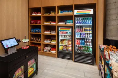 a store with two refrigerators in a grocery store at Hampton Inn by Hilton New York Times Square in New York